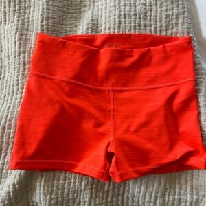 Athleta Yoga Orange Athletic Shorts with Wide Waistband and Compression Fit